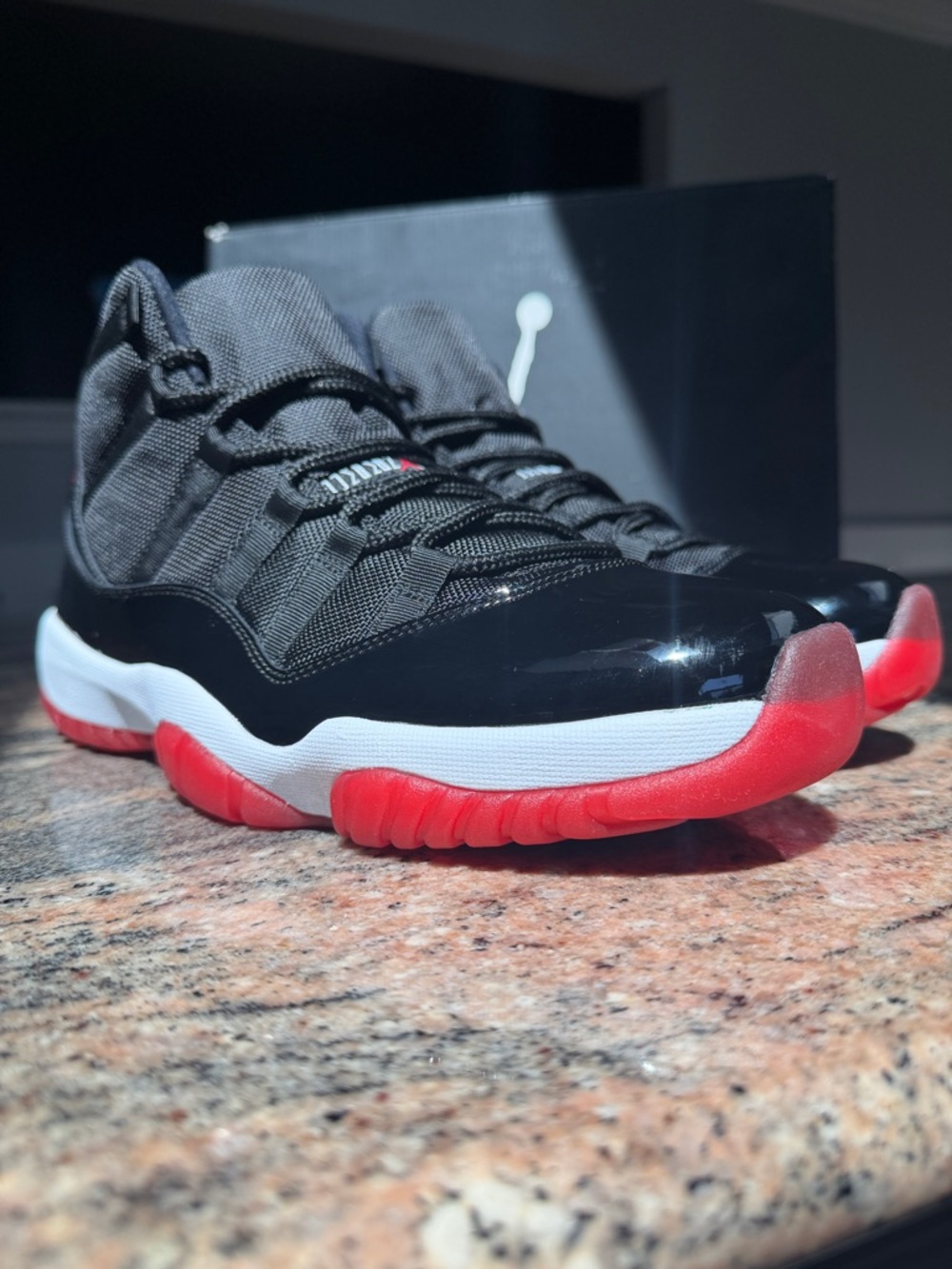 Jordan 11 “Playoff” “BRED”